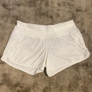 Lulu lemon white speed up mid rise lined short - 4 inch. Size 6.